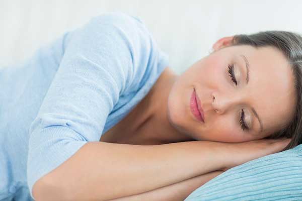 Sedation dentistry patient receiving comfortable treatment at Encino dental office