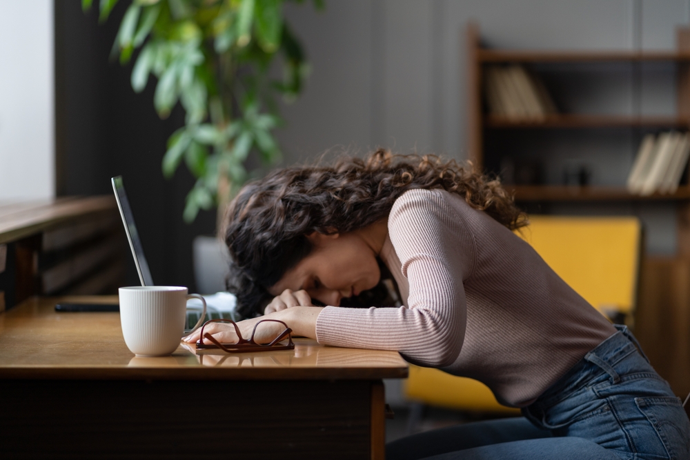 Overworked,Tired,Female,Student,,Freelancer,Or,Remote,Worker,Sleep,Lying Exhaustion at work caused by sleep apnea