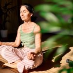 Woman,Practicing,Yoga,And,Meditation,At,Home,Sitting,In,Lotus Mindfulness for sleep