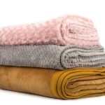 Folded,Blankets,On,A,White,Background